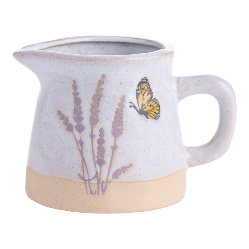 Ivory Wax Resist Ceramic Flowers and Butterfly Creamer